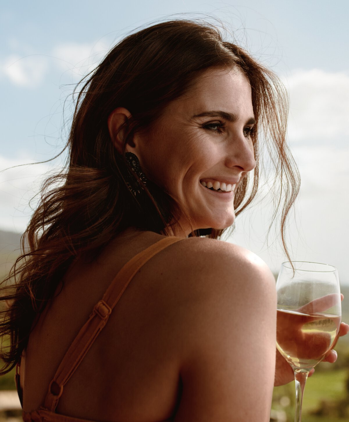 Washington DC Juvederm model holding a glass